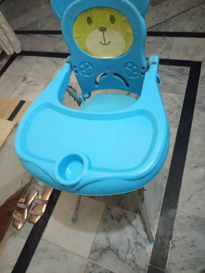 a high chair in good condition