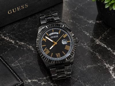 GUESS Men’s Black & Gold Watch