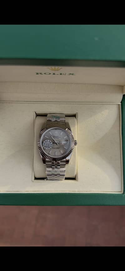 Rolex date just Silver/Sunburst Fluted (silver-tone) automatic