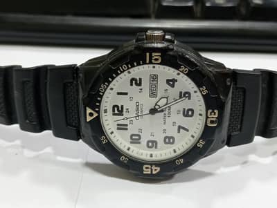 Casio watch 5125 MRW-200 H day and date watch 38 mm dial size