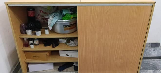 Multi purpose wooden storage cabinet with sliding door