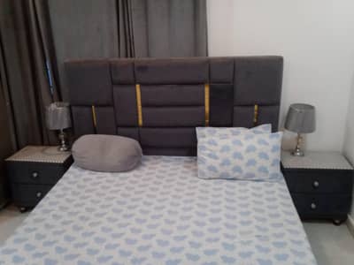 1 bed and 2 side table