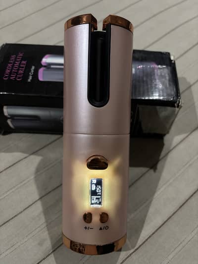 Cordless automatic curler