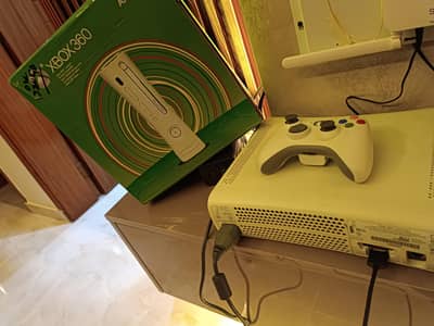 Xbox 360 for sale with one wireless controller (negotiatable) 80+games