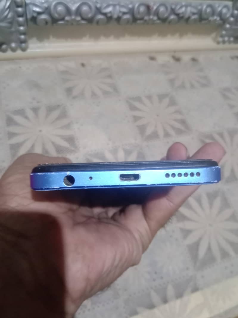 Infinix Smart7 3