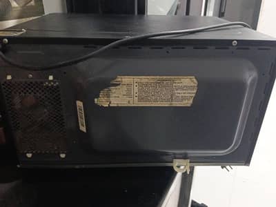signature microwave oven in good condition very less use