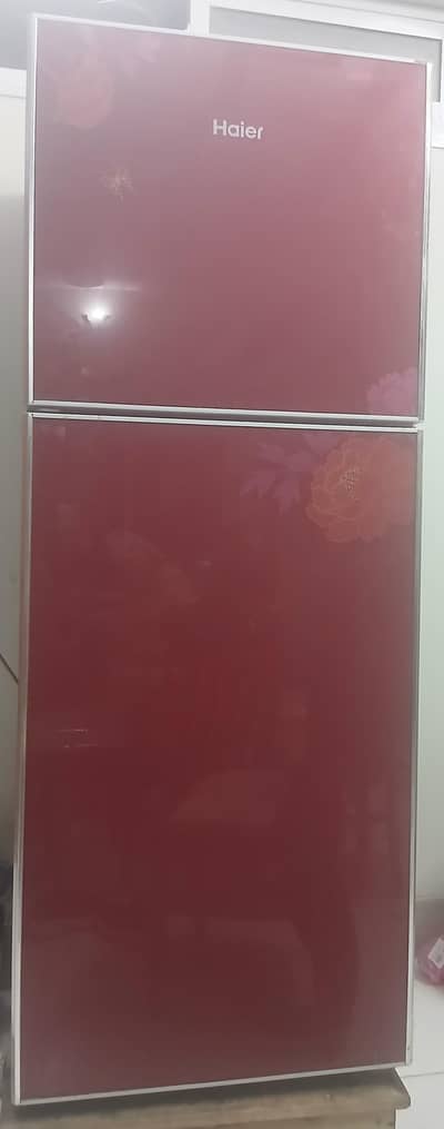 haier fridge double door red colour glass doots neat and clean