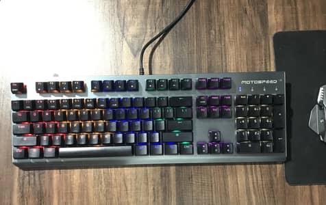 MOTOSPEED CK108 Mechanical Keyboard with orange switches.