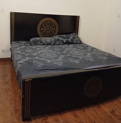 Double wooden bed