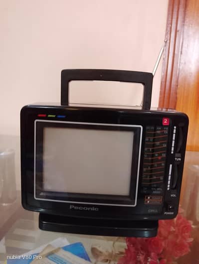 Pconic vintage color tv with radio