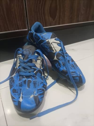 Football boots miner damage