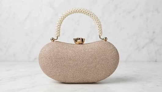 girls metal printed fancy clutch