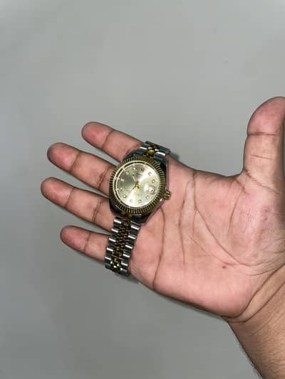 ROLEX GOLDEN AND SILVER