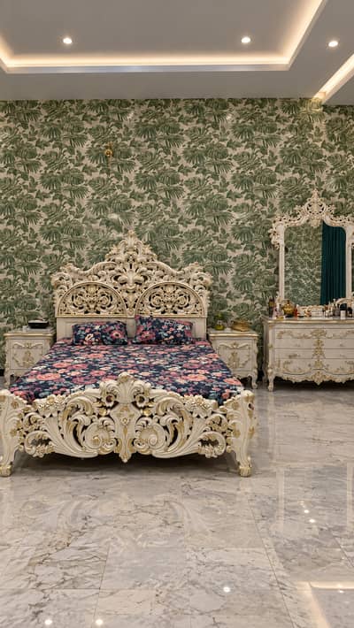 Original wooden bed and dressing tables
