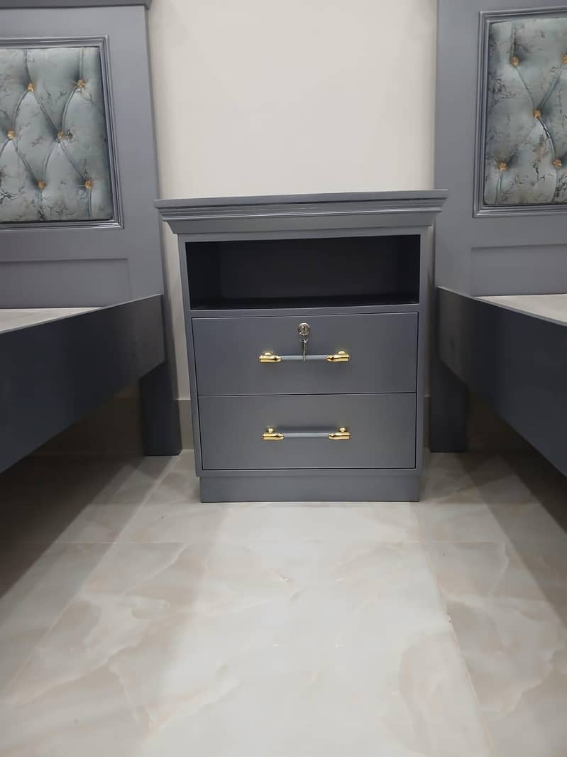 Two Single beds and 1 side table 0