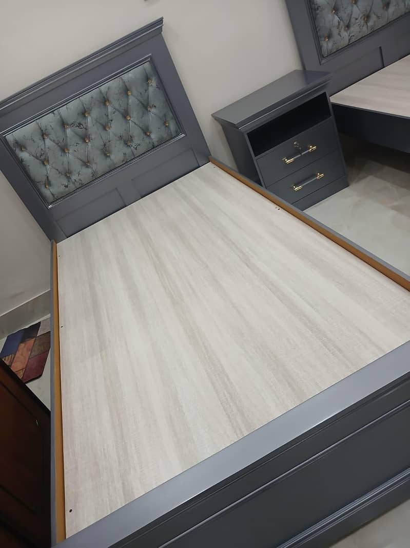 Two Single beds and 1 side table 3