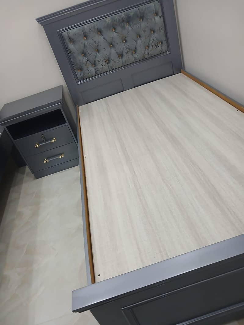 Two Single beds and 1 side table 6