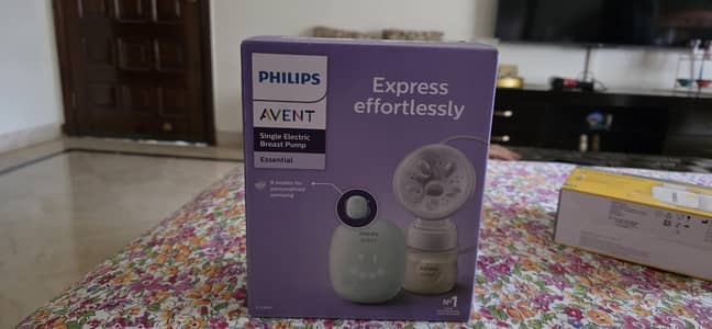 Avent electric breast pump with free storage bottles