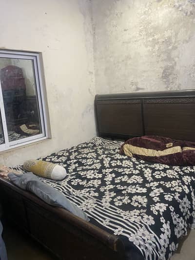 Pure wooden bed for sale urgent