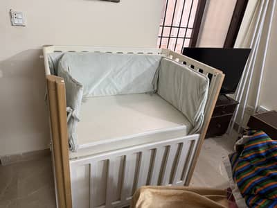 Wooden baby cot