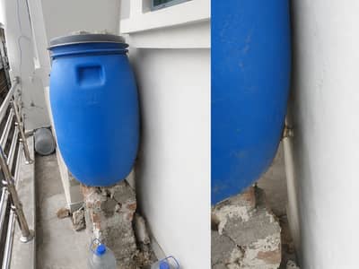 Mid size blue drum water tank
