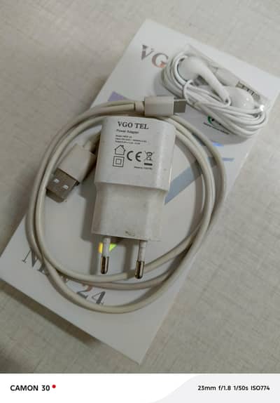 vgo tel new24 4+4/128 with box charger