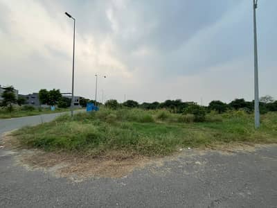 Corner 1 Kanal Premium Plot With Access Area Situated At Elite Neighborhood Of Block U Phase 7 DHA Lahore