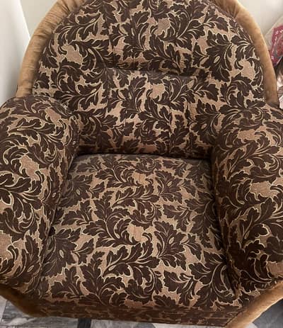 bed with side table and dressing table safa and safa chairs .