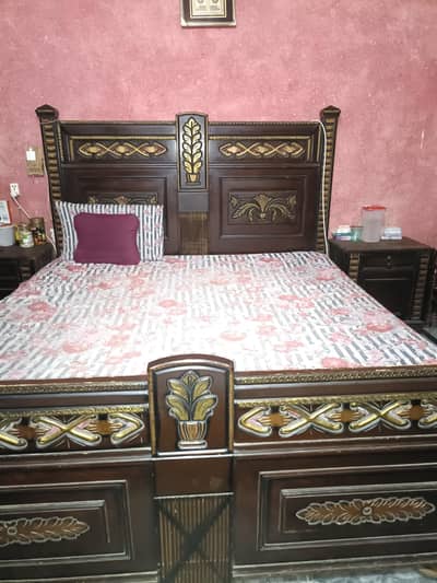 bed with side tbles and dressing
