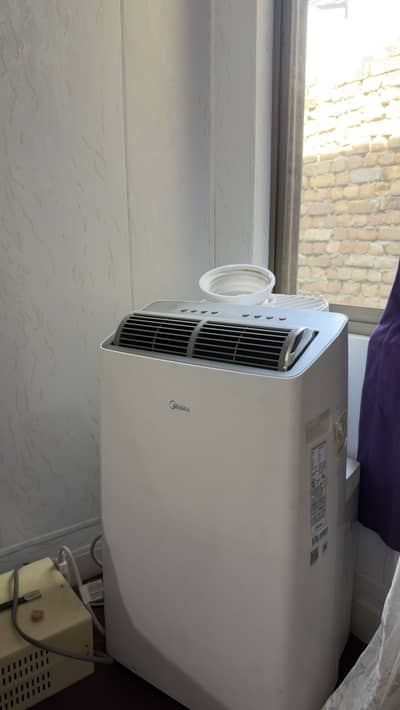 Midea portable AC 2025 model with stabilizer