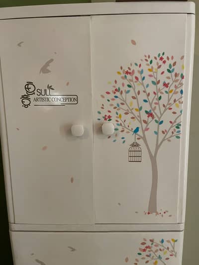 Baby Wardrobe. A two door wardrobe,with 4 wide spacious drawers.