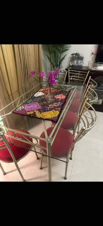 dinning table and 6 chairs. high quality glass