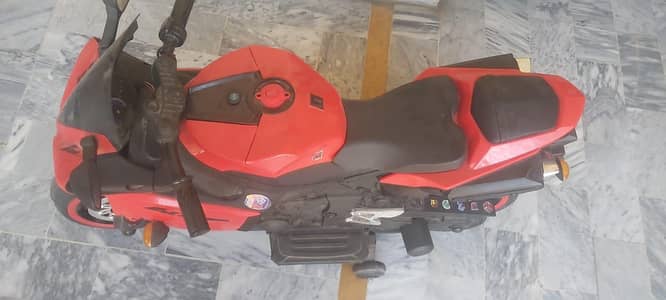 red heavy bike for kids with music with chargeable batry