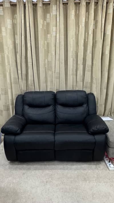 Two seater black leather Recliner for urgent sale!