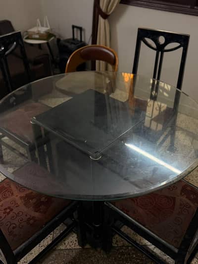 Elegant Glass top dining table set , black frame  4 seater