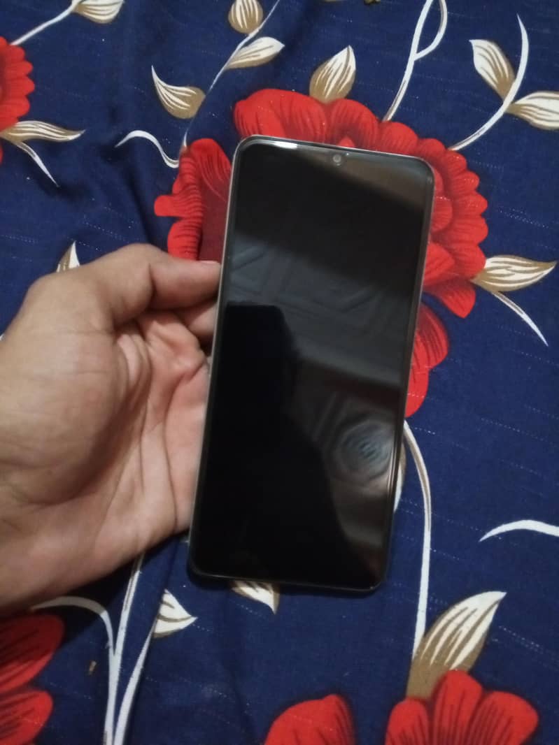 Realme Note 60x 4
