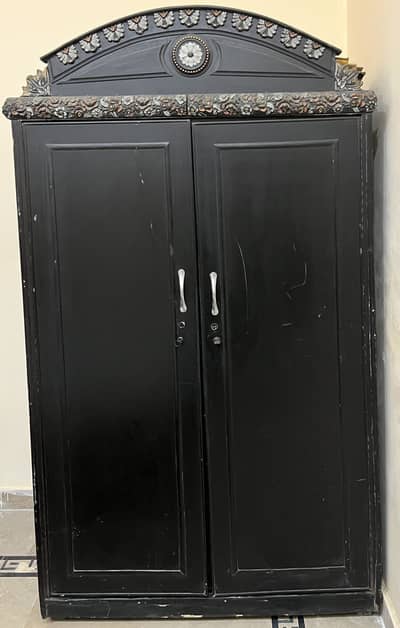 2 door wooden cupboard.