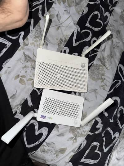 2 ptcl routers available with box and accessories