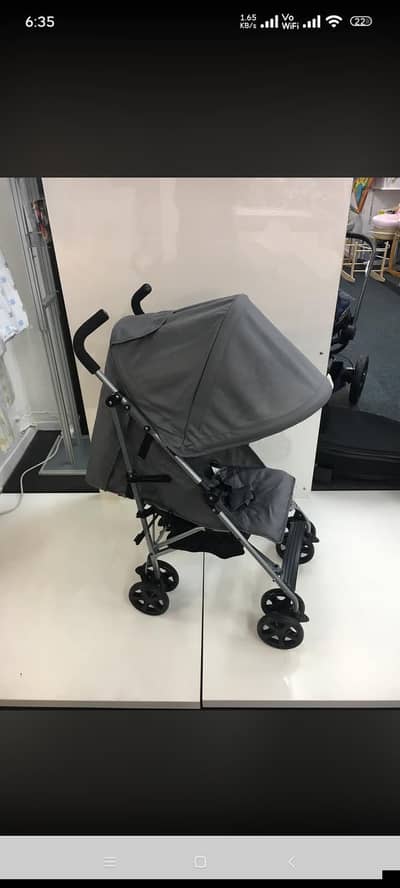 Used imported  baby Stroller + automatic musical swing for sale