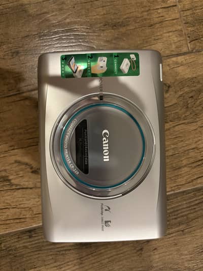new digitalcanon mini photo printer with all accessories and box