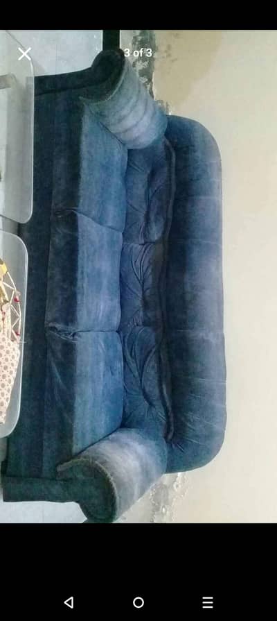 Blue color 6 seater sofa.