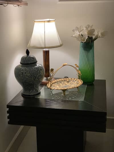 a pair of wooden tables