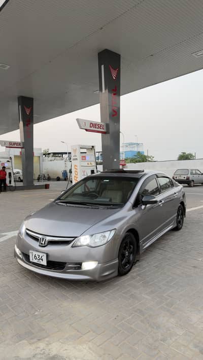 Honda reborn 2007 full option lahore registered side touch good con