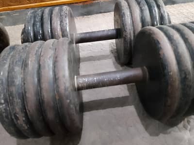 DUMBELL PAIR FOR SALE EACH DUMBELL 35 KG TOTAL 70 KG DUMBELLS