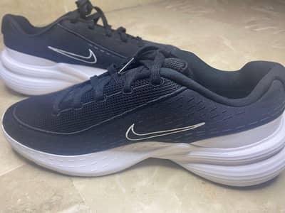brand new black Nike sports shoes from england