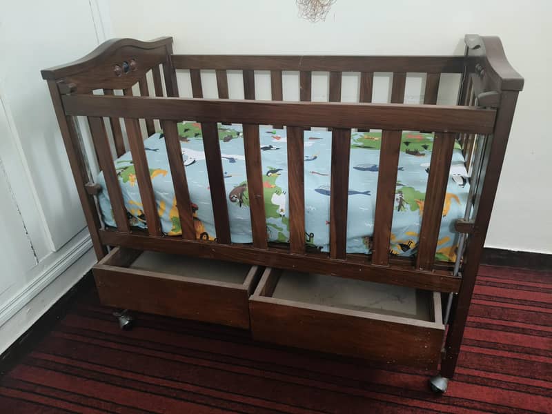 Solid wood adjustable baby cot 1
