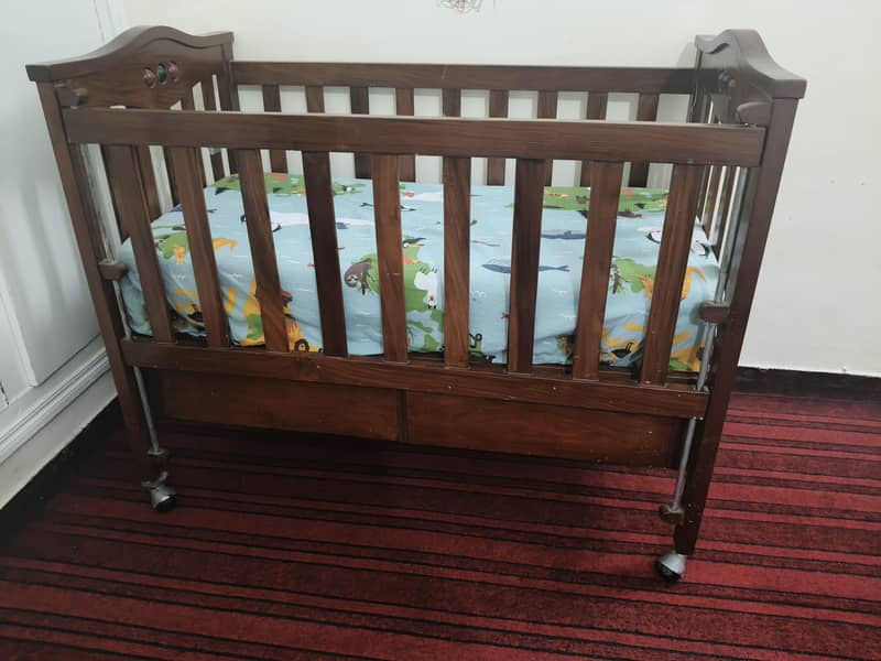Solid wood adjustable baby cot 2