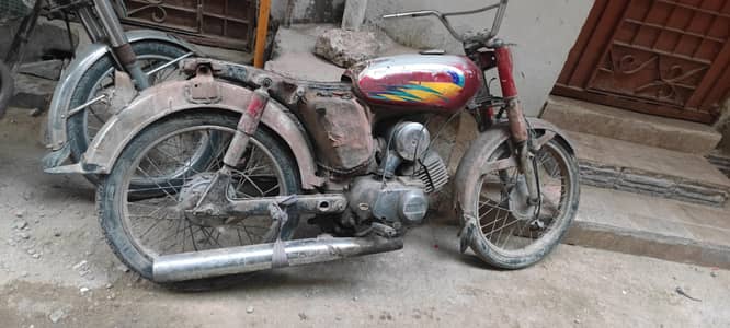 oppo Reno 5 5g or Yamaha 100 Karachi no old model