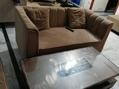 6 seater sofa set with table and cushions negotiable