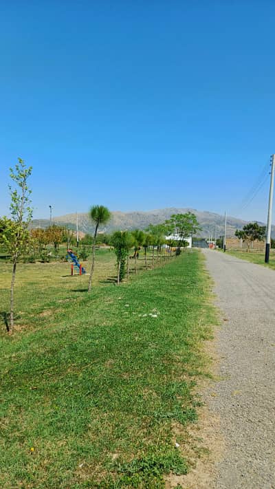 Taxila garden corner park face lavel with DPC plot for sale